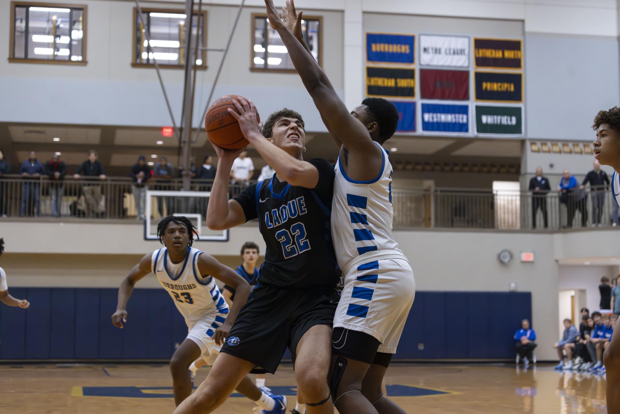 Boys varsity basketball defeats John Burroughs Nov. 20