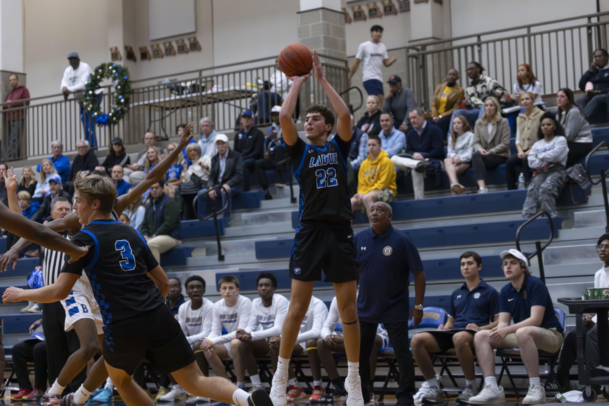 Boys varsity basketball defeats John Burroughs Nov. 20