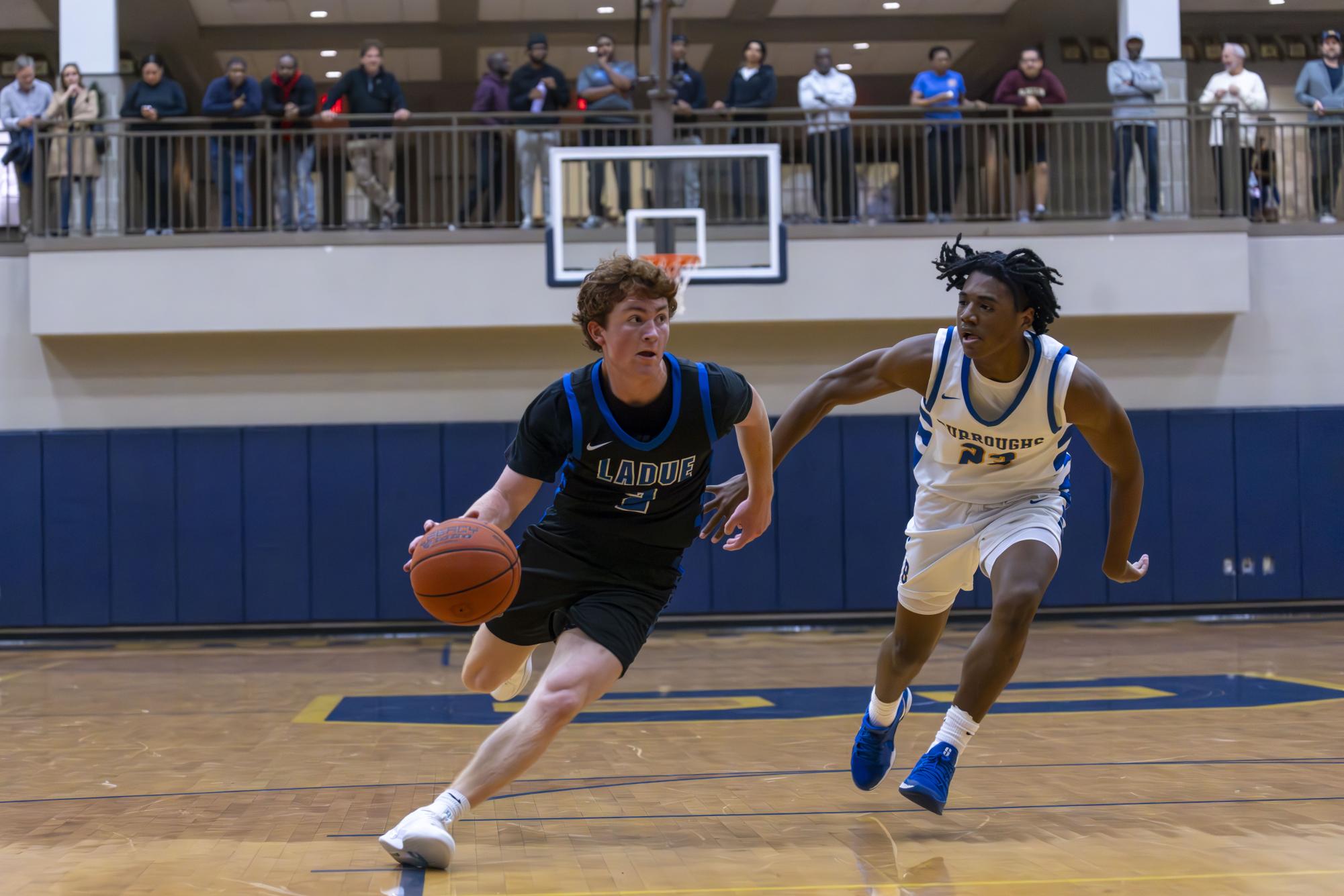 Boys varsity basketball defeats John Burroughs Nov. 20