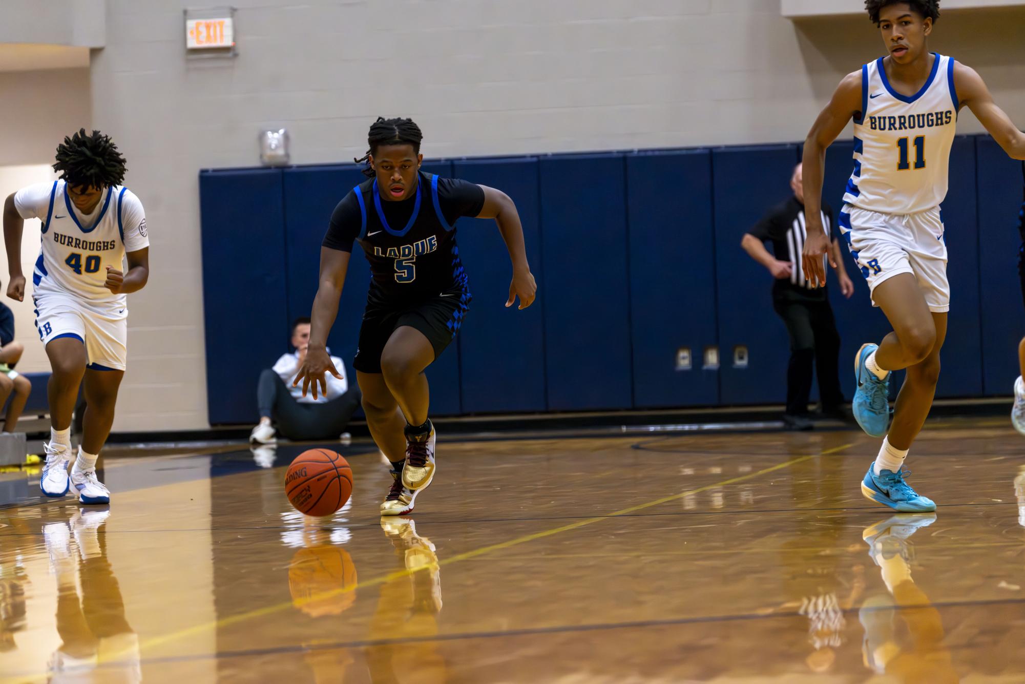 Boys varsity basketball defeats John Burroughs Nov. 20