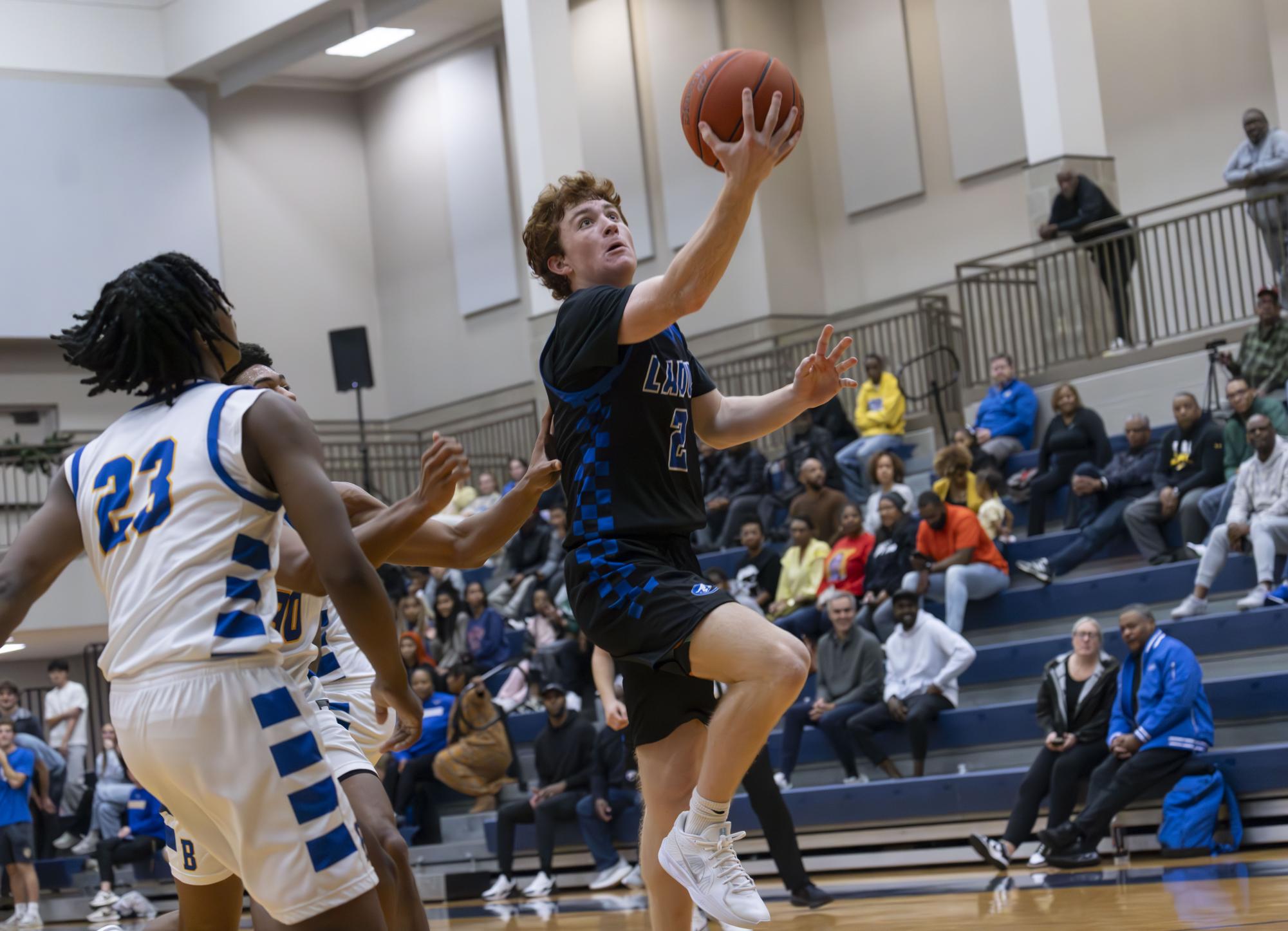 Boys varsity basketball defeats John Burroughs Nov. 20