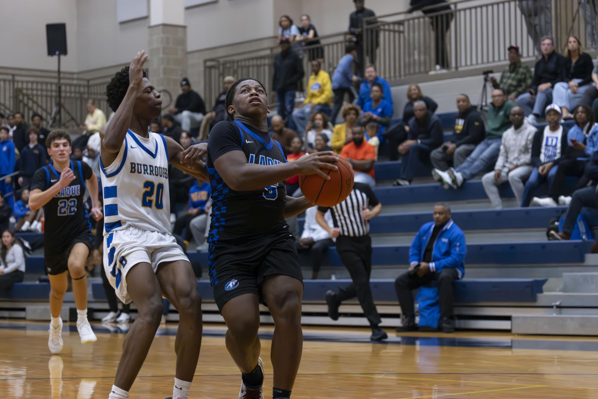 Boys varsity basketball defeats John Burroughs Nov. 20