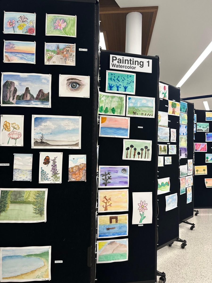 Painting I classes display projects in student entrance
