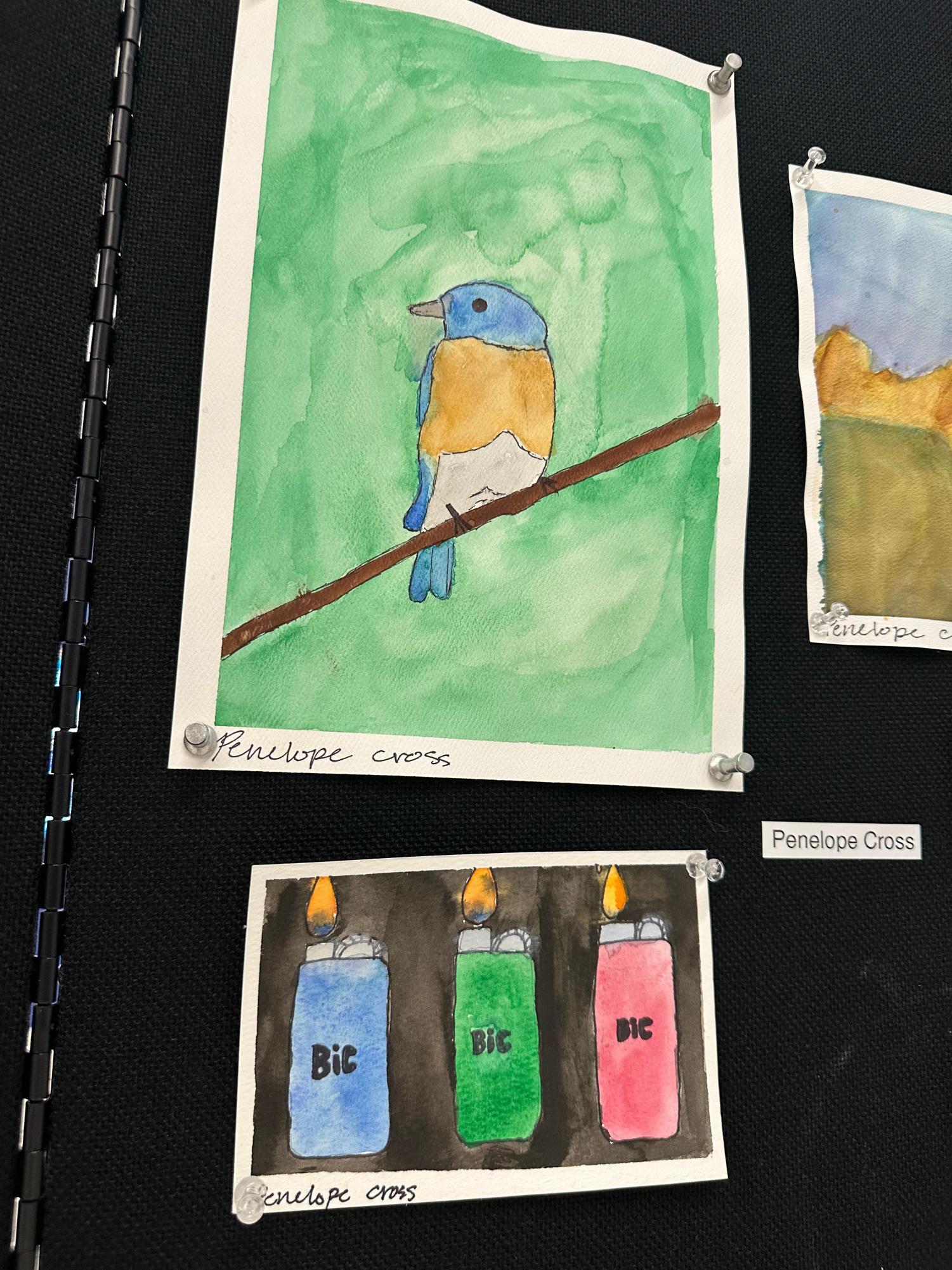 Painting I classes display projects in student entrance