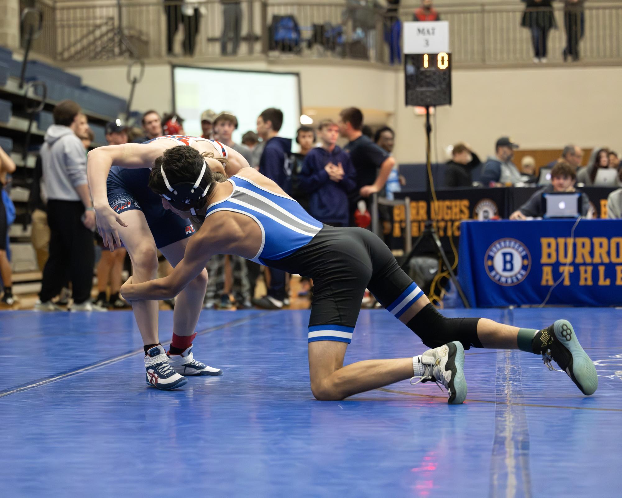 Varsity wrestling brings home trophies from the John Burroughs Tournament Dec. 5-6
