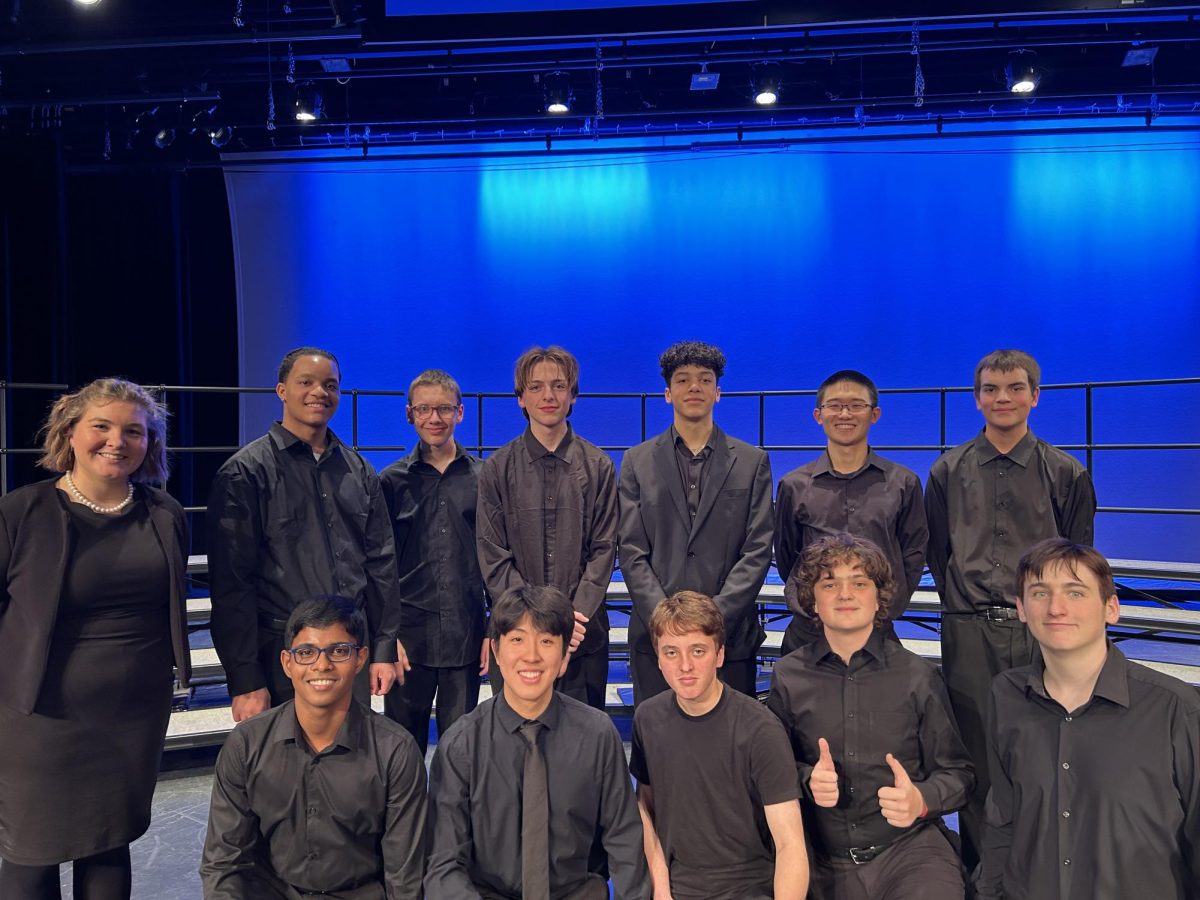 Choir poses for a photo during a performance. Choir members feel connected with each other and have a strong sense of family together. "Choir has an amazing community, and I love how supportive and chill the teachers are," Zhao said. 

Photo credit to Anthony Zhao.
