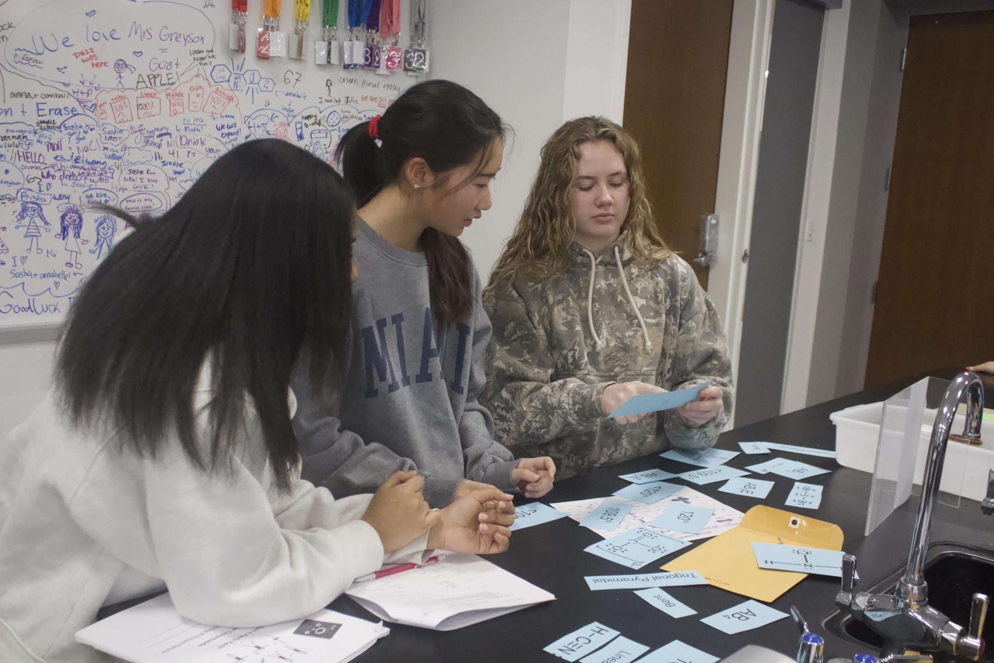 Chemistry students work on VSEPR lab Jan. 21