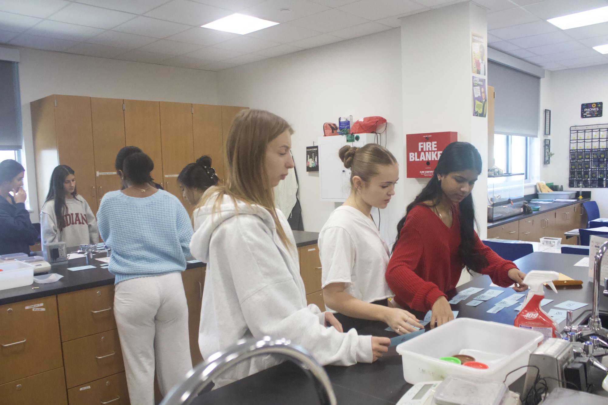 Chemistry students work on VSEPR lab Jan. 21