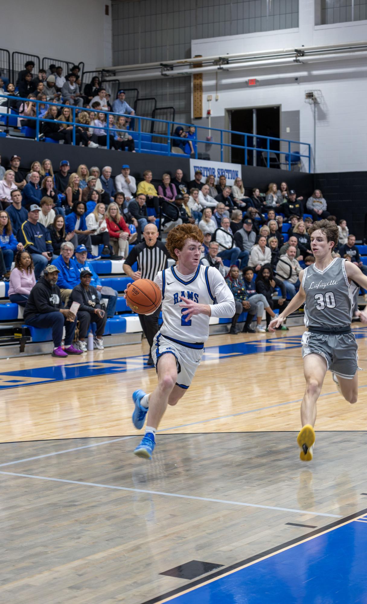 Boys varsity basketball defeats Lafayette 77-69 Jan. 9