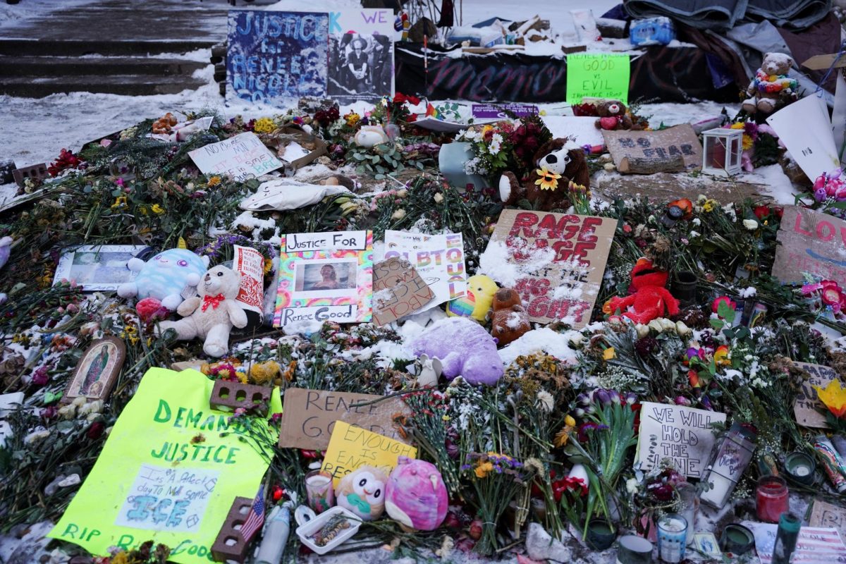 Flowers, toys and signs lie at a makeshift memorial at the site of the fatal shooting of Renee Nicole Good by a U.S. Immigration and Customs Enforcement (ICE) agent on January 7, in Minneapolis, Minnesota, U.S., January 21, 2026. REUTERS/Seth Herald