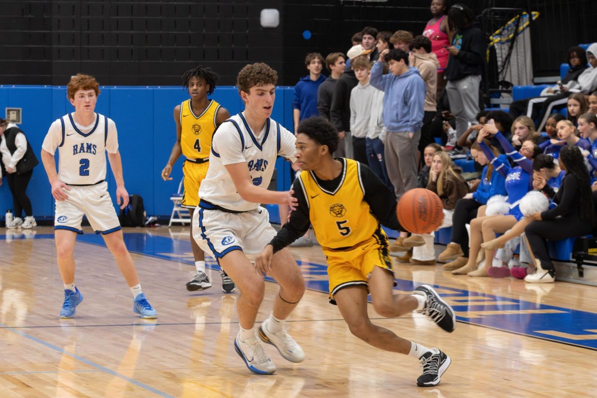 Boys varsity basketball team falls to UCity Jan. 13. They put up a good fight throughout the whole game but ultimately ended up defeated 56-77.
