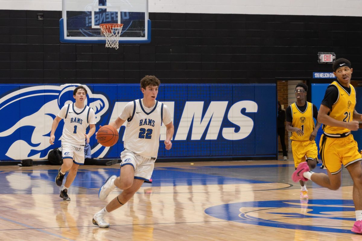Boys varsity basketball team falls to UCity Jan. 13. They put up a good fight throughout the whole game but ultimately ended up defeated 56-77.