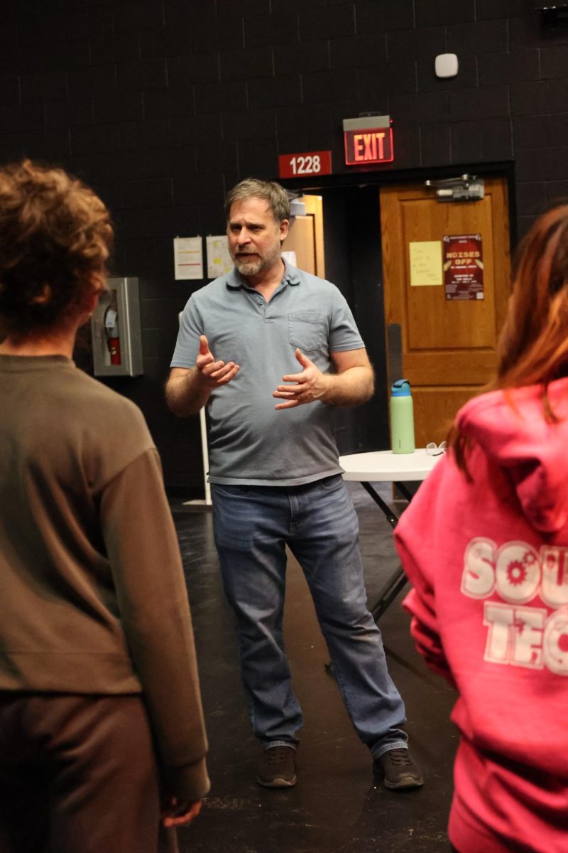 The cast and crew prepare for the winter musical, Legally Blonde, after school. Since November 2025, almost every day after school, students and teachers work on producing the musical. “We’ve got the set crew building this set,” Director Justin Scheuer said. “We’ve got the lighting crew that’s hanging the lighting equipment. There’s a lot of props in the show and a lot of costumes. We have a publicity area, and they’re putting together the poster and the program and getting the word out so people can come see the show. It’s a lot of plates spinning at once.”