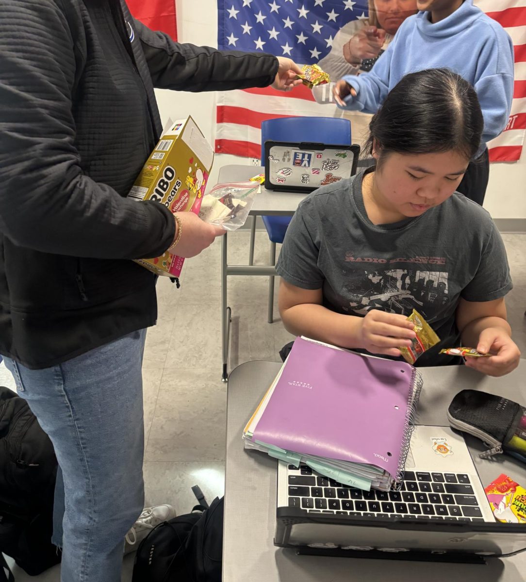 Riley Keltner gives out gummy bears as her valentines to her students. She has planned several holiday parties in the past, the previous one being Thanksgiving. “[My favorite part] is the excitement that I see from my seminar, when they buy into it, and when they want to get involved with it and do it,” Keltner said. 
