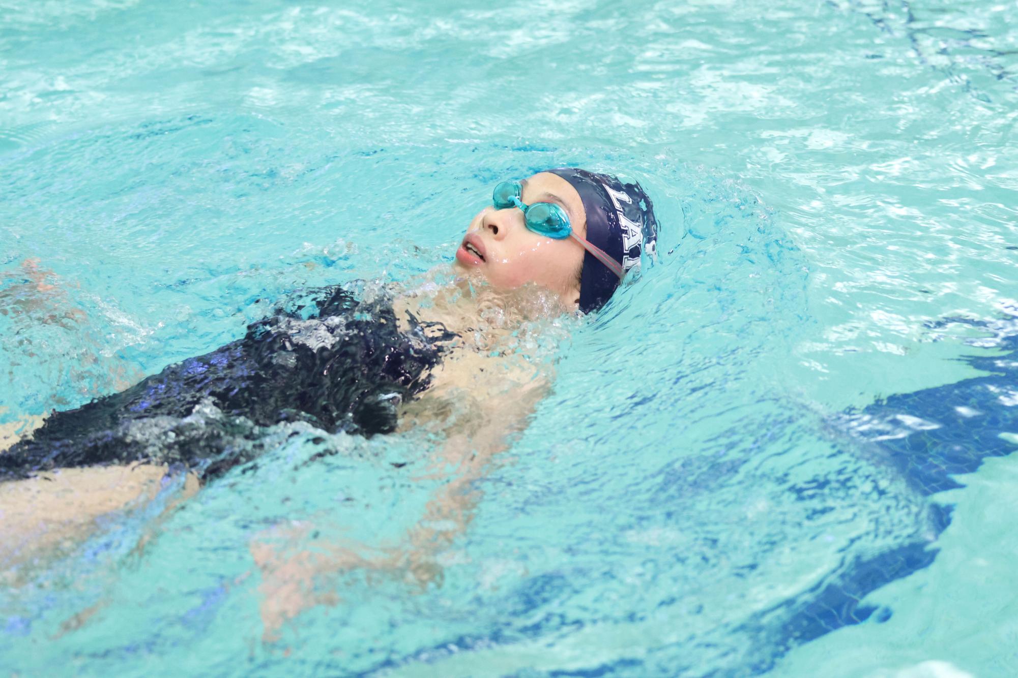 Girls swim faces off against Visitation Academy Feb. 10