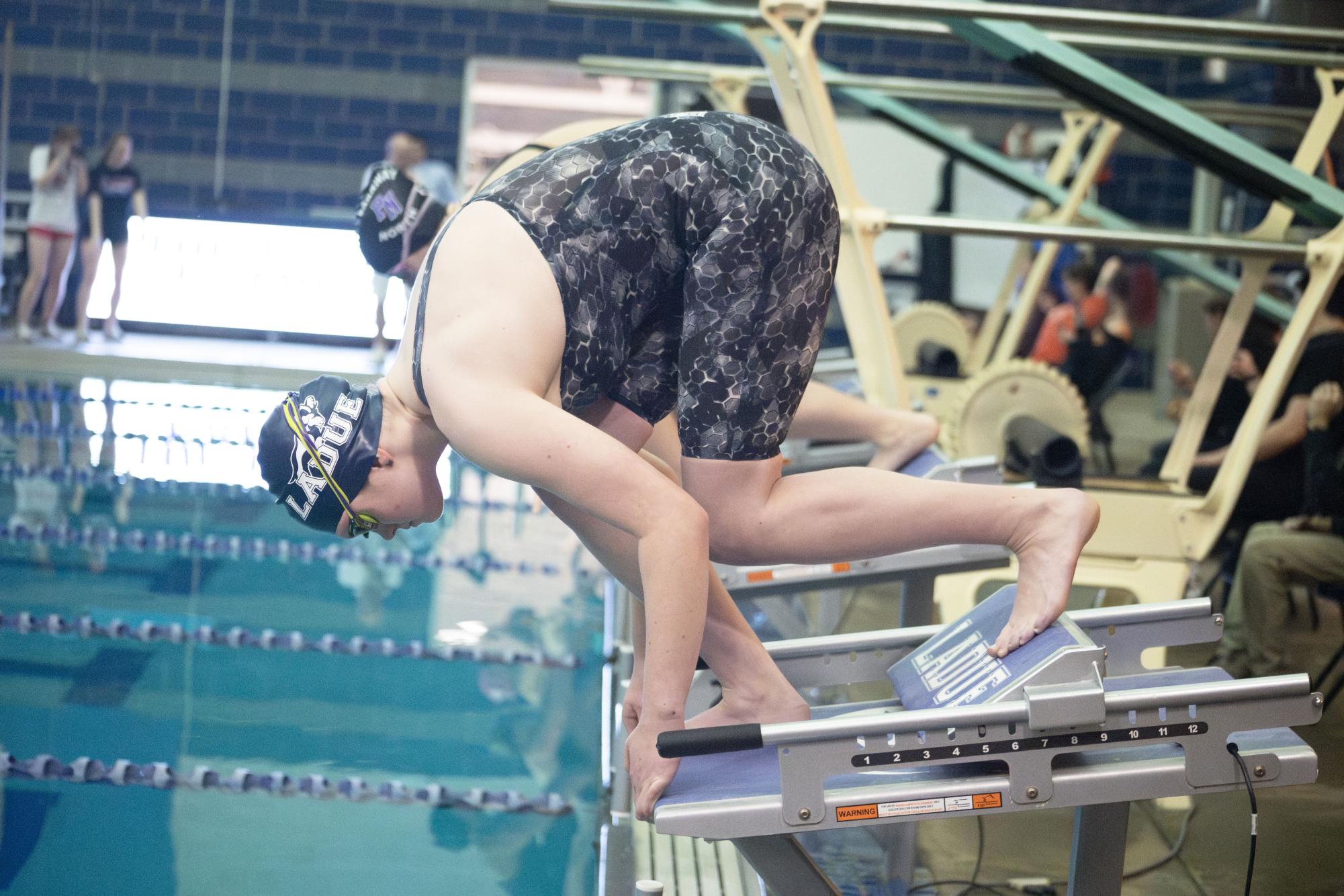 Girls swim team faces off in Red Pool Conference Meet Feb. 4