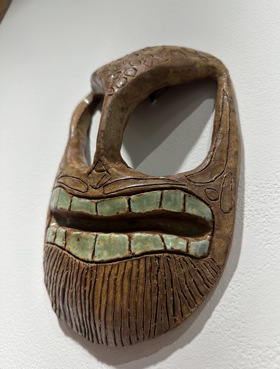 Ceramics I classes display masks in Spirtas Gallery Feb. 24