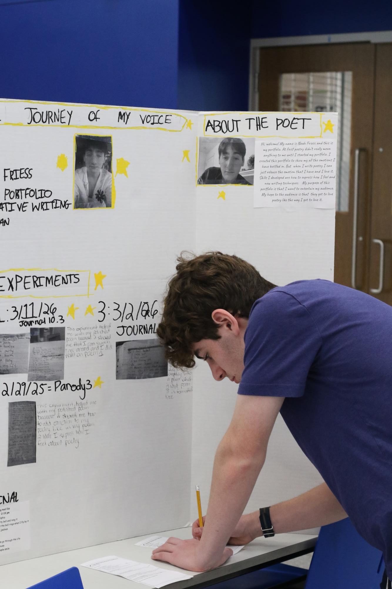 Creative Writing classes display poetry portfolio posters March 26
