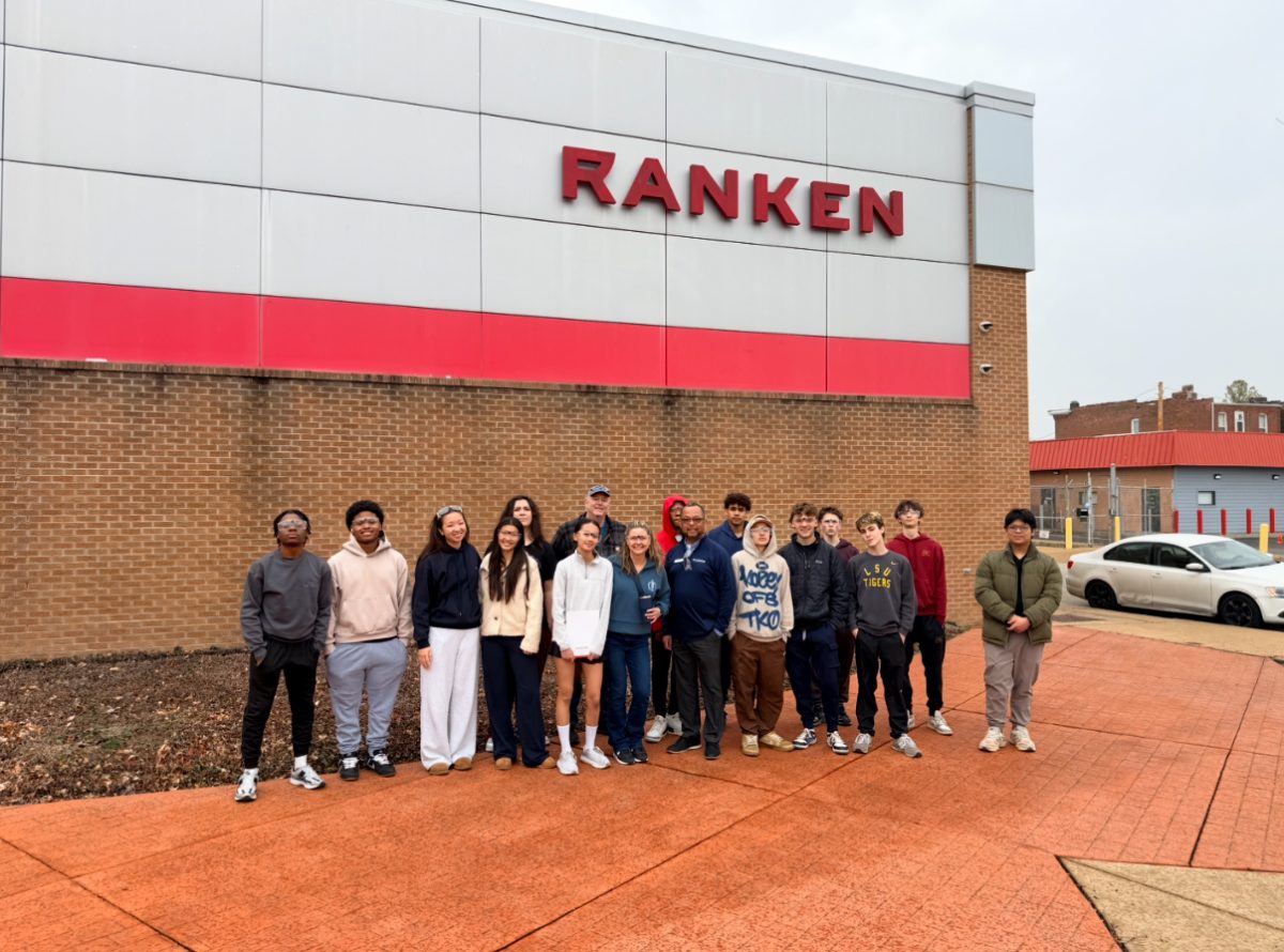 Students stand outside of the technology center at Ranken Technical College. They were able to explore different facilities and buildings that featured various trades. "Seeing all of the amazing labs as classroom settings was super eye-opening," Zoe Mei (10) said. "It showed me a different side of post high school education."
