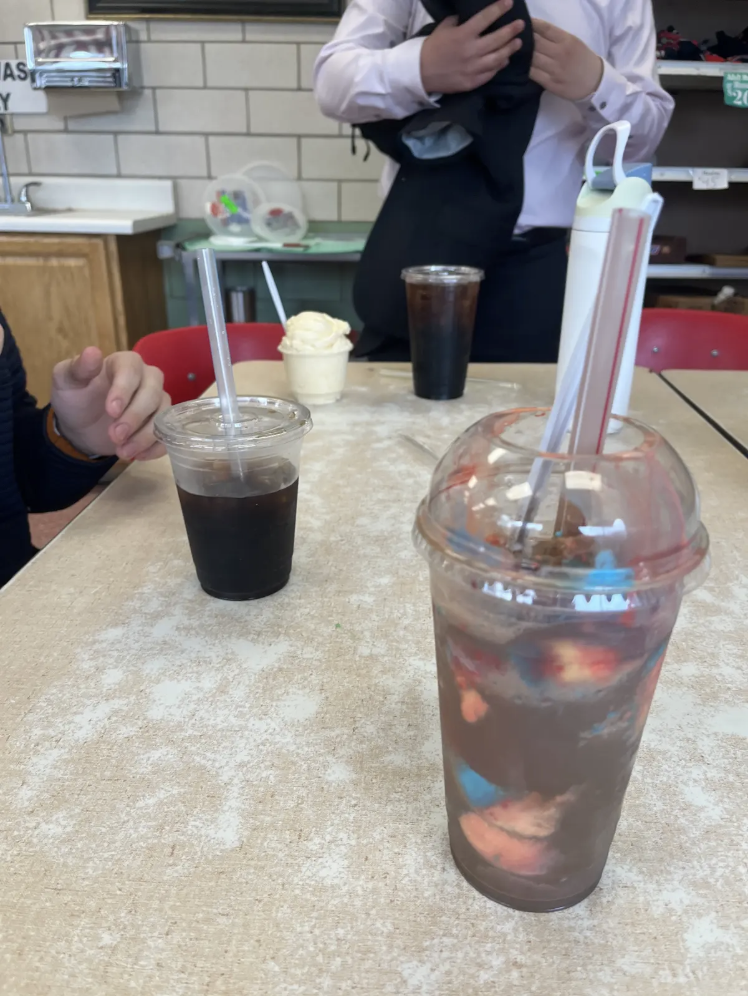A root beer float of 'Superman' flavored ice cream.