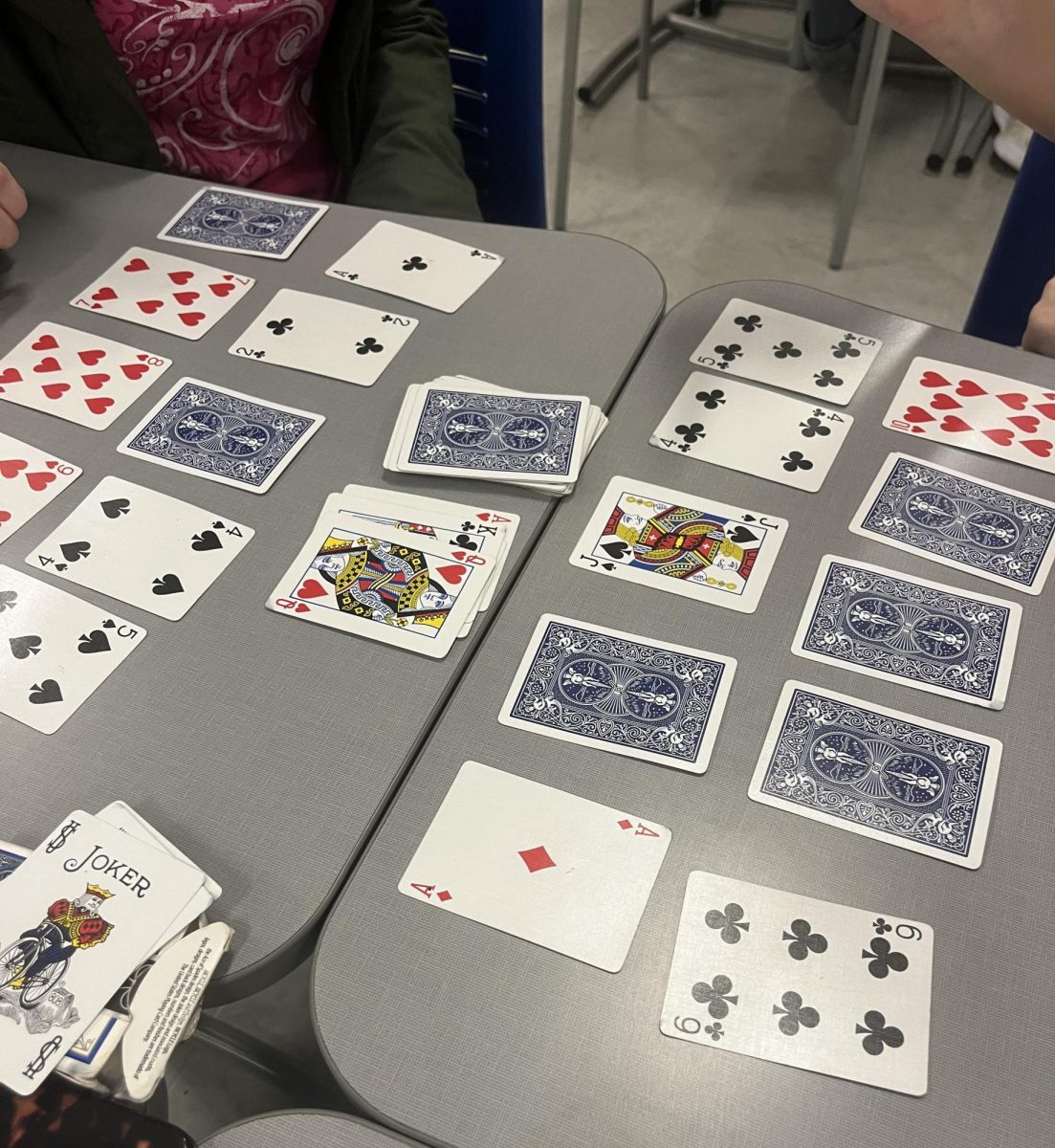 Statistics students assemble a deck of cards to prepare for their card game project. Aside from tracking data and patterns, students enjoy getting to engage in entertaining activities. "I've learned how to play slapjack [since] I didn't know how to play before," Nylah Saffold (12) said.