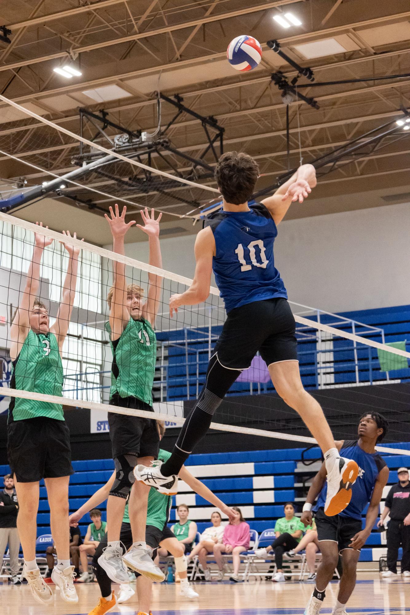 Boys varsity volleyball triumphs Mehlville 3-1 April 17