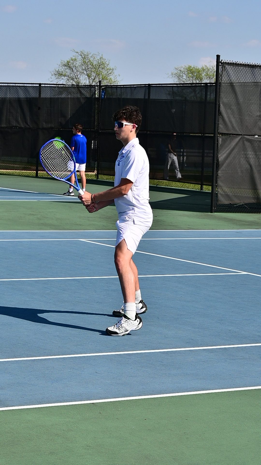 Boys Varsity Tennis Competes Against Westminster March 30
