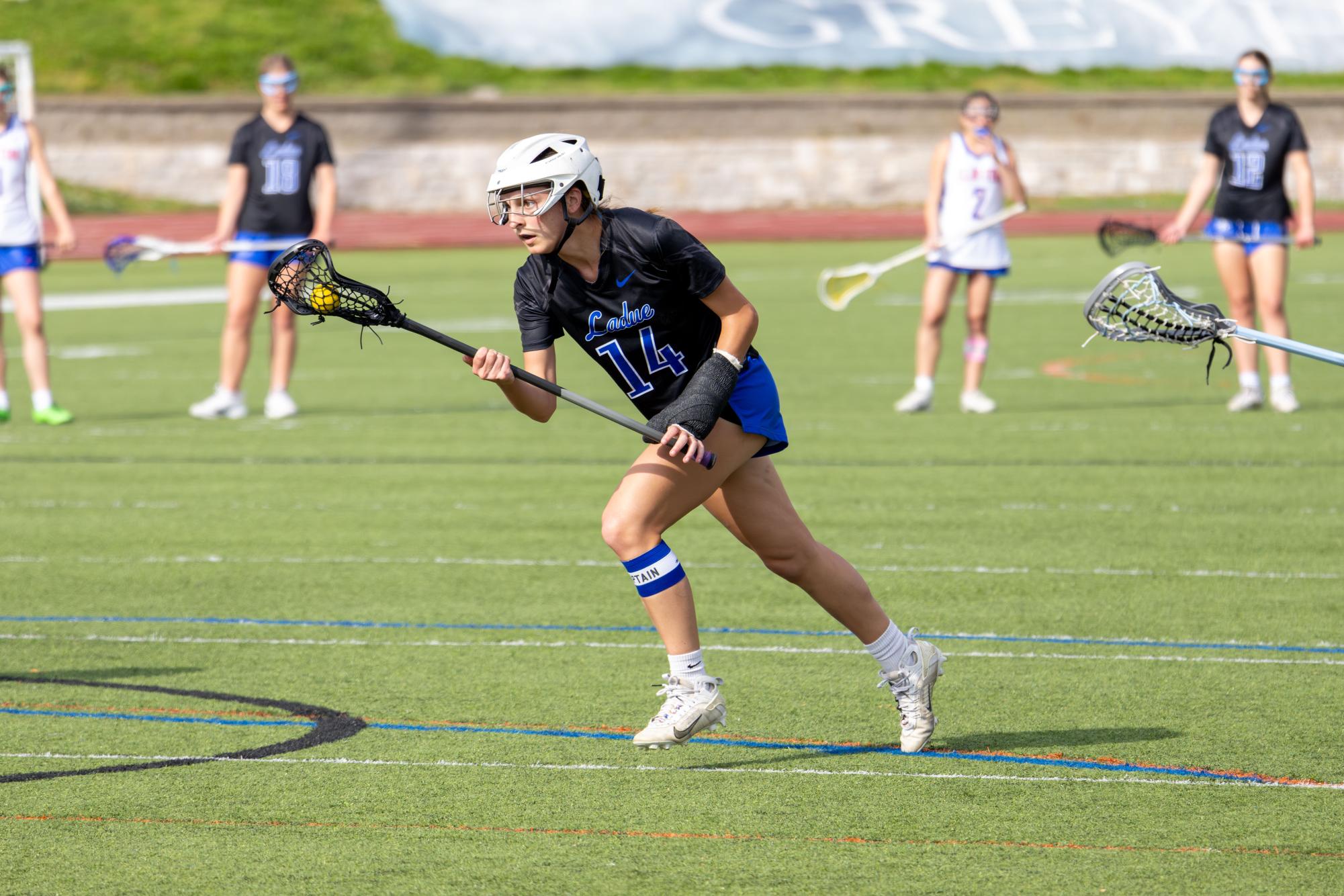 Varsity girls lacrosse takes the win against the Greyhounds April 10