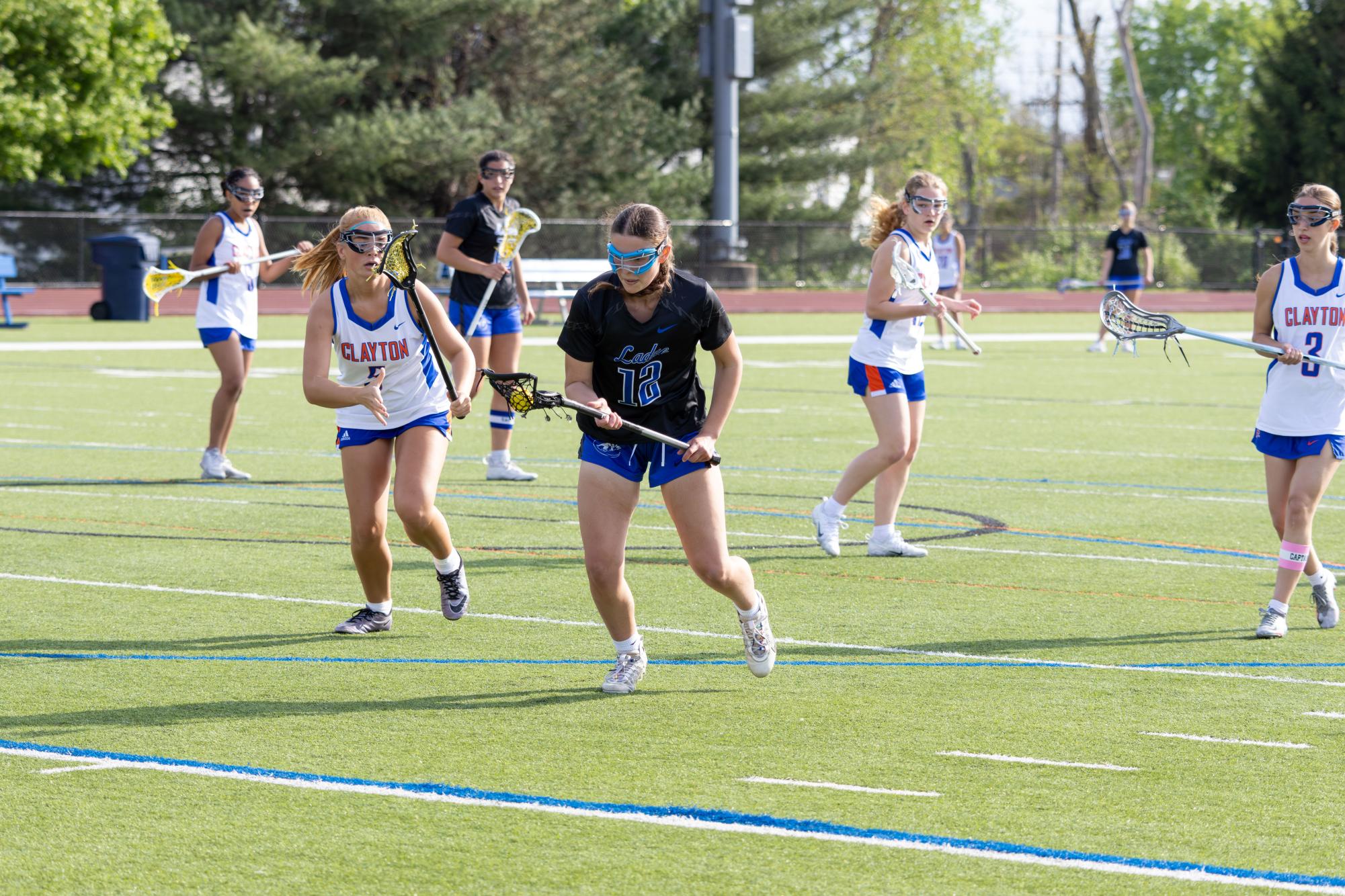 Varsity girls lacrosse takes the win against the Greyhounds April 10