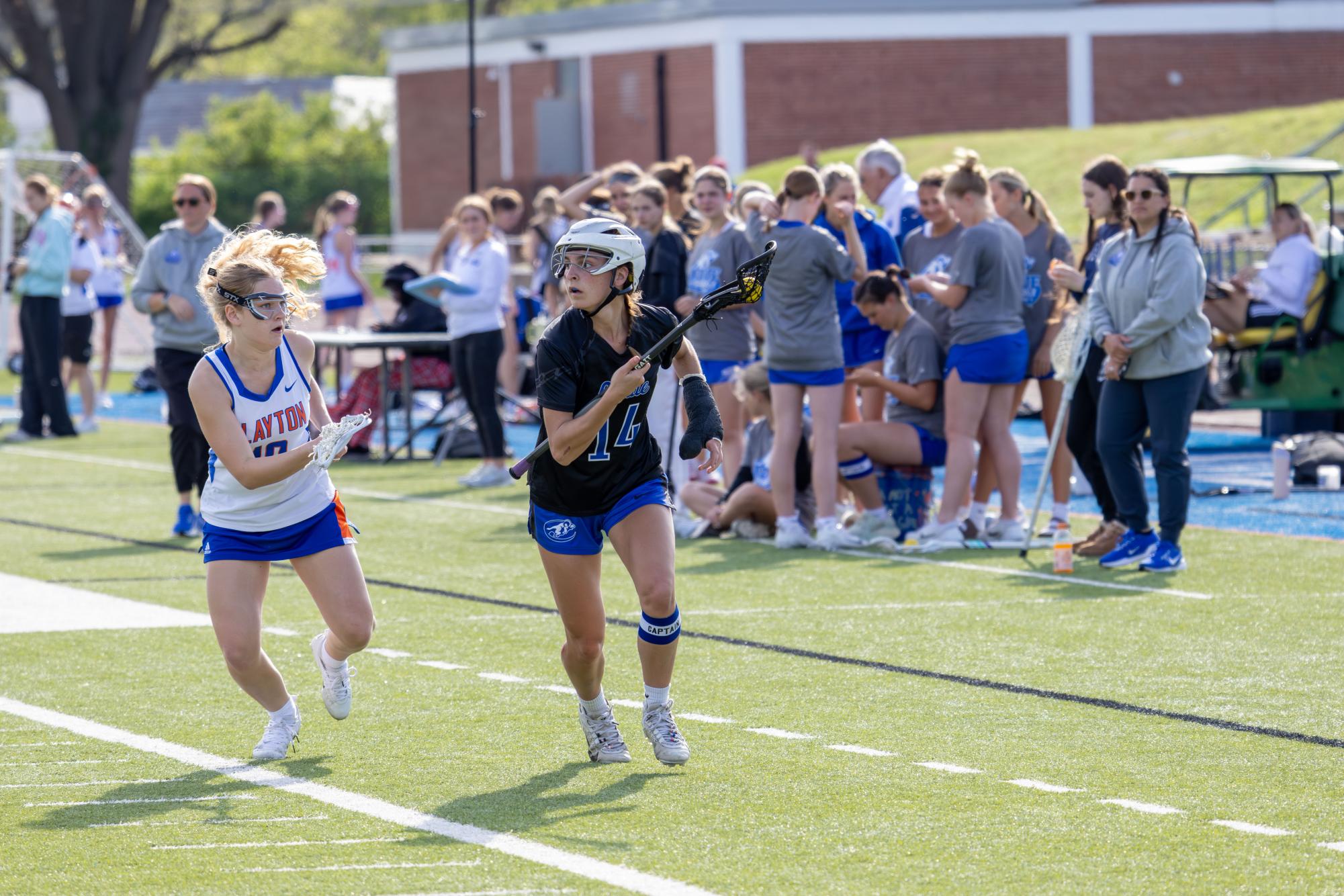 Varsity girls lacrosse takes the win against the Greyhounds April 10