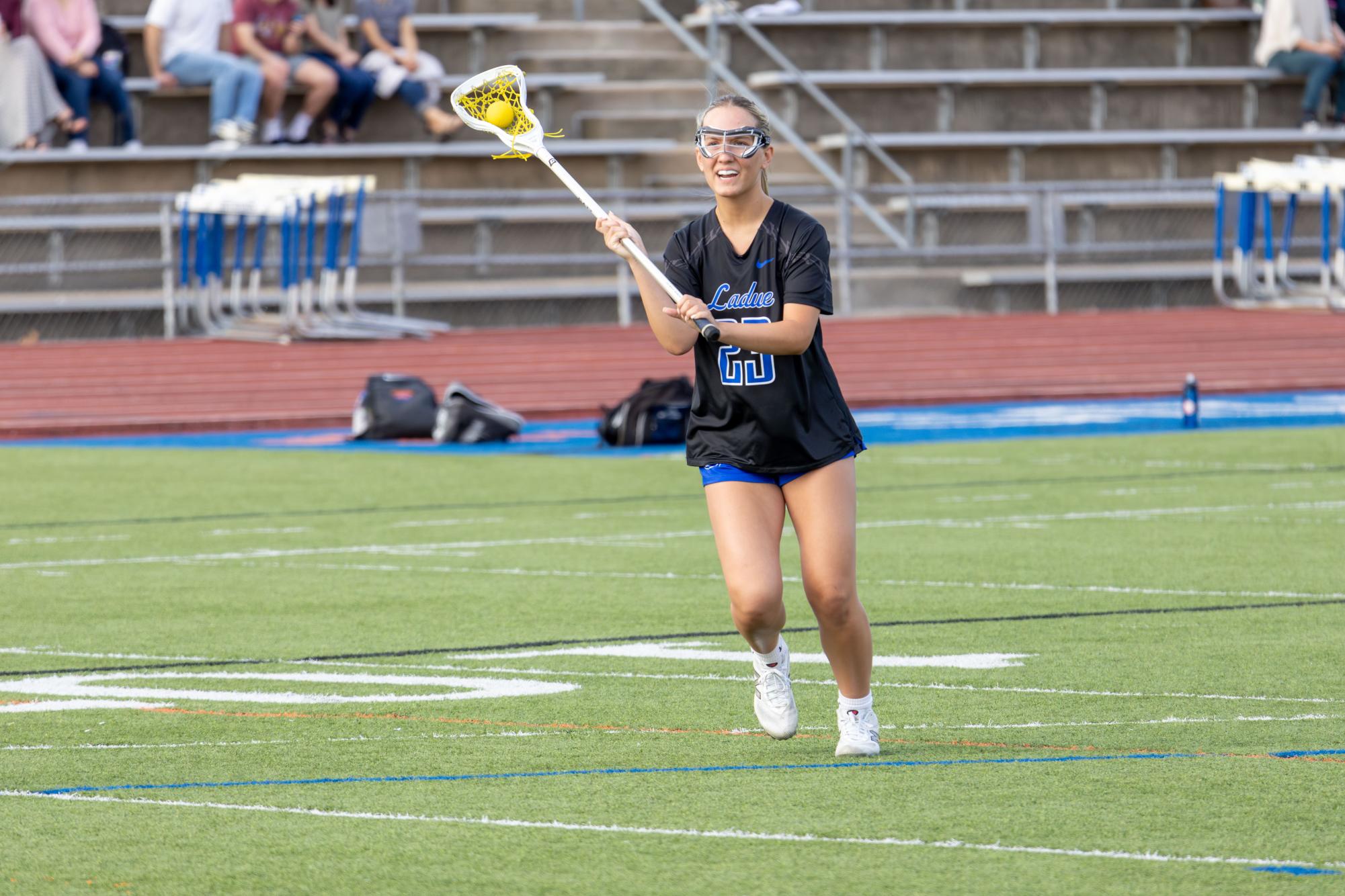 Varsity girls lacrosse takes the win against the Greyhounds April 10