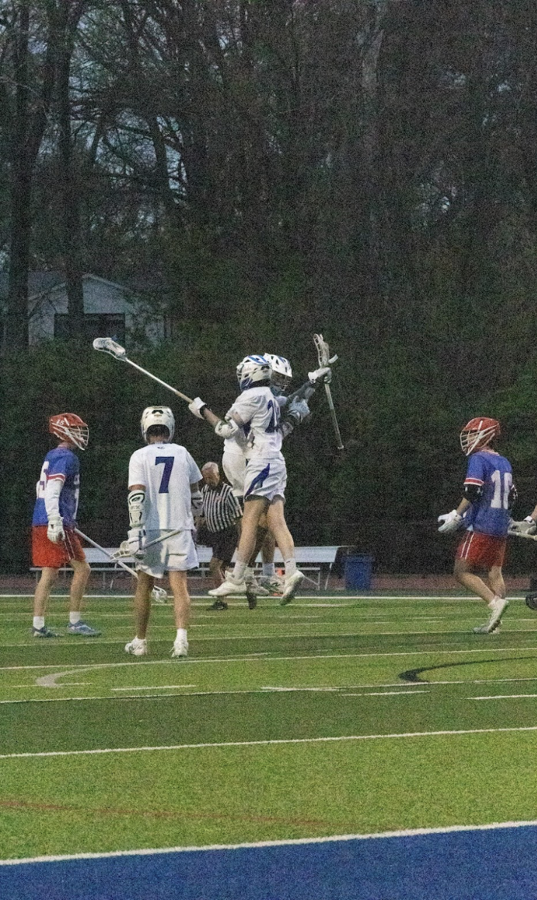 Varsity boys lacrosse defeats Clayton April 10
